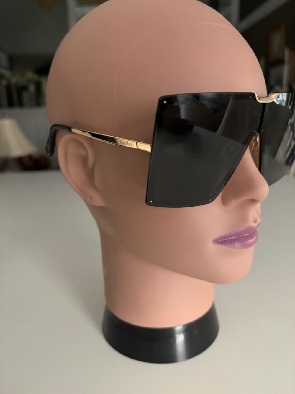 MaxMara Black Shield Sunglasses with Gold Accent